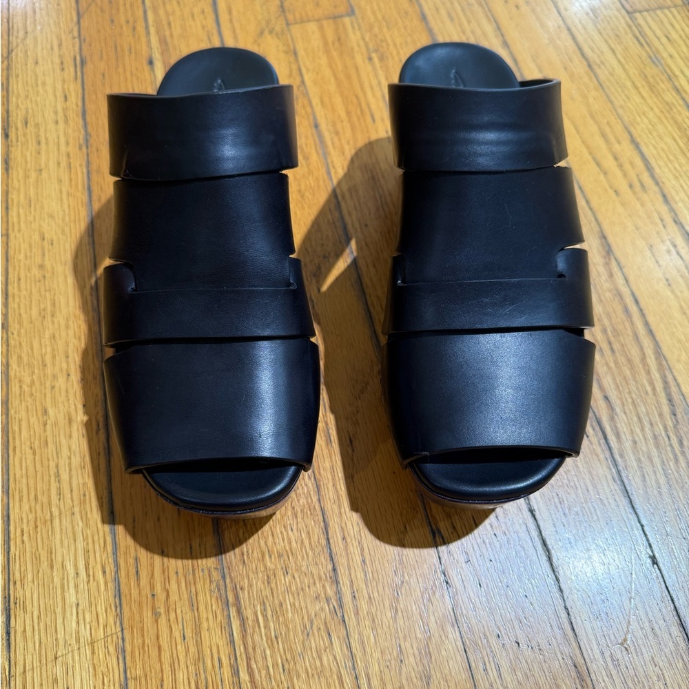 Rick Owen’s black leather wood platform sandals clogs